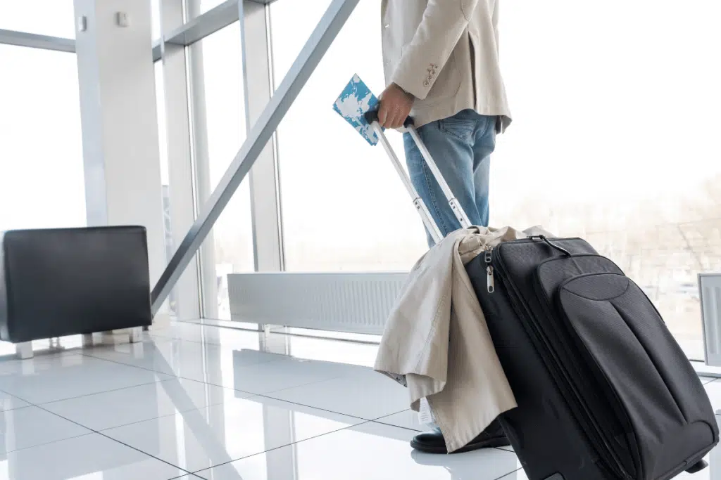 man in airport travelling