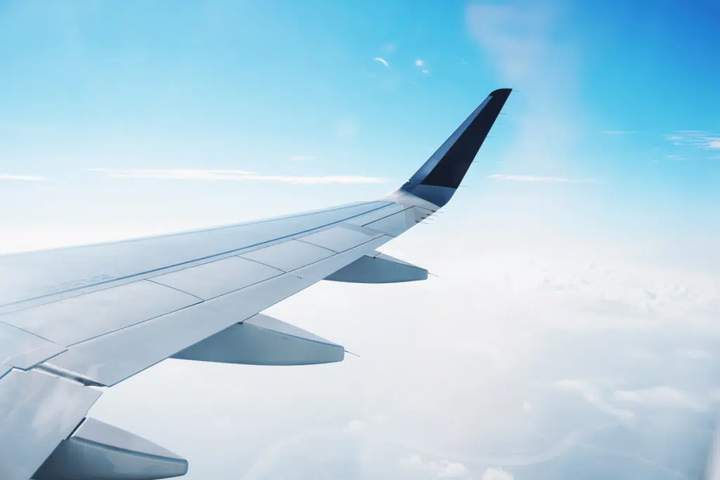 Airplane wing symbolising travel