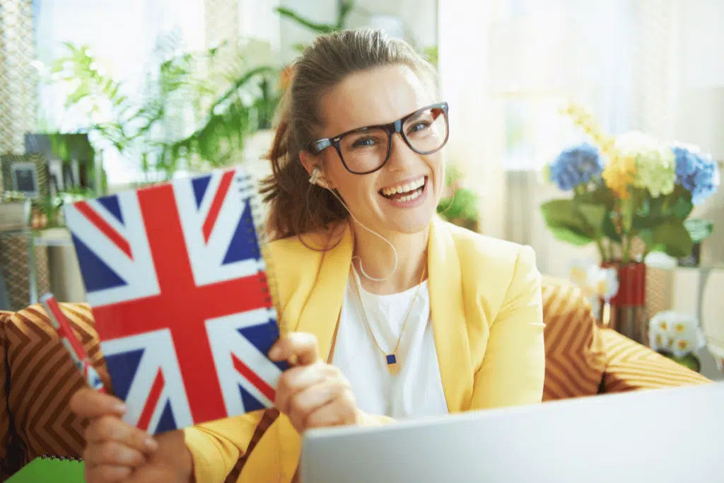 woman with British flag and laptop