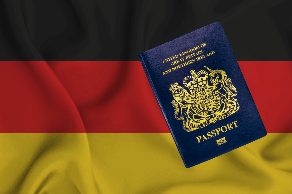 British passport against the backdrop of a German landmark