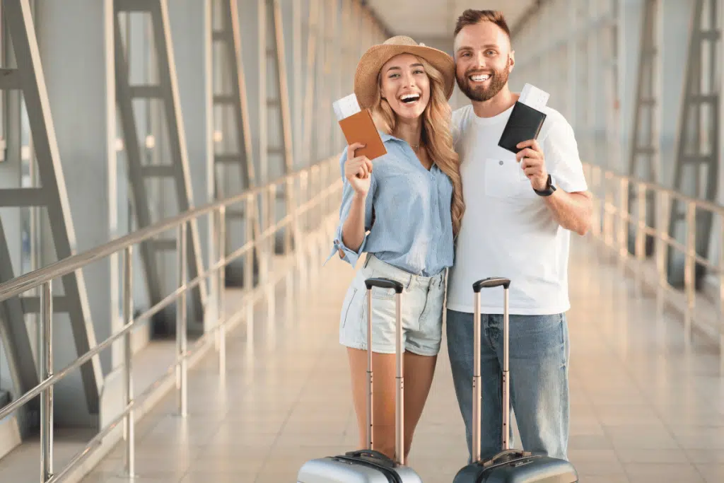 two people with their british passports in hand